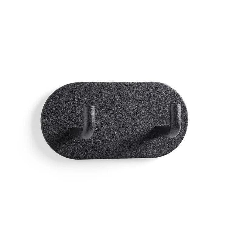 Minimalistische Metallhaken zum Aufkleben
