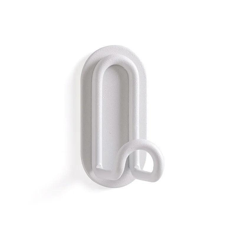 Minimalistische Metallhaken zum Aufkleben