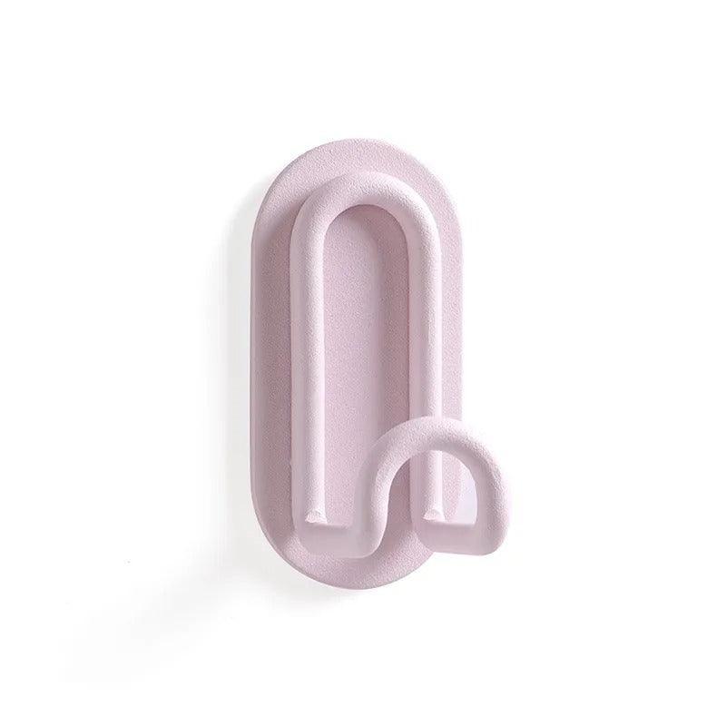 Minimalistische Metallhaken zum Aufkleben